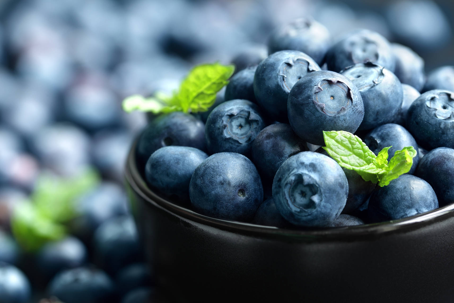 Bowl Overflowing With Blueberries Wallpaper