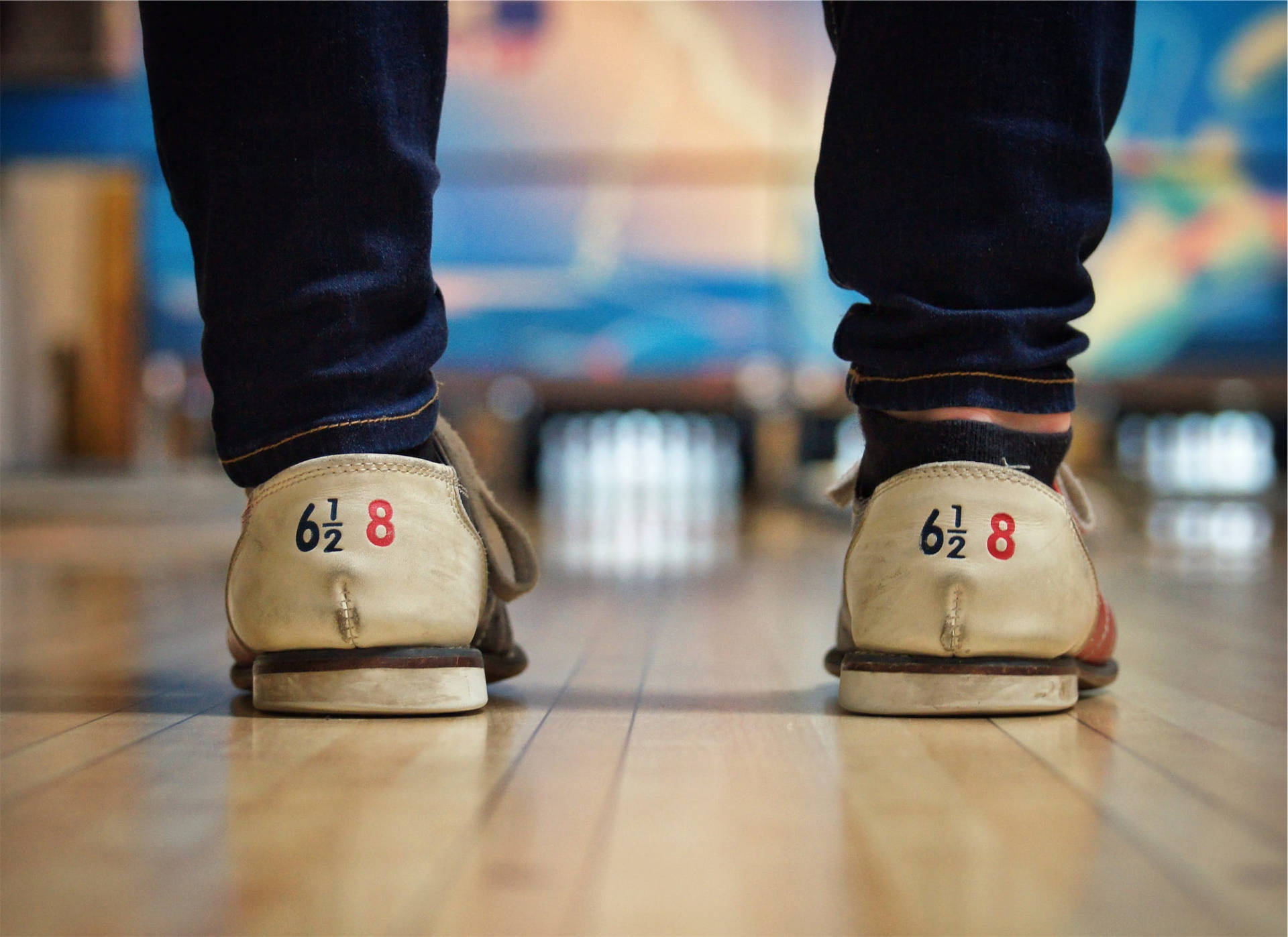 A pair of Bowling Shoes On The Floor Wallpaper