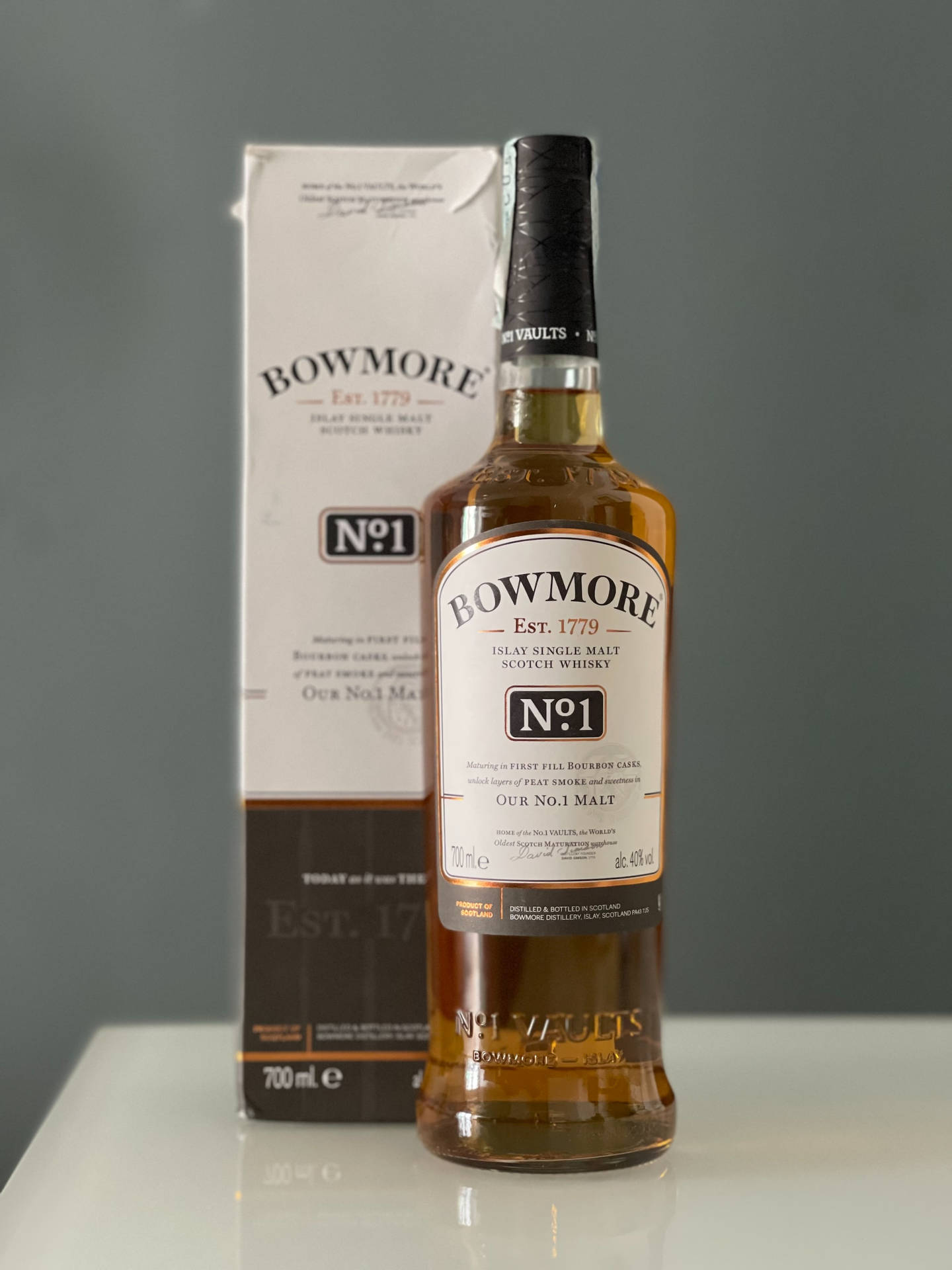 Botellade Bowmore Whiskey Empacada Fondo de pantalla