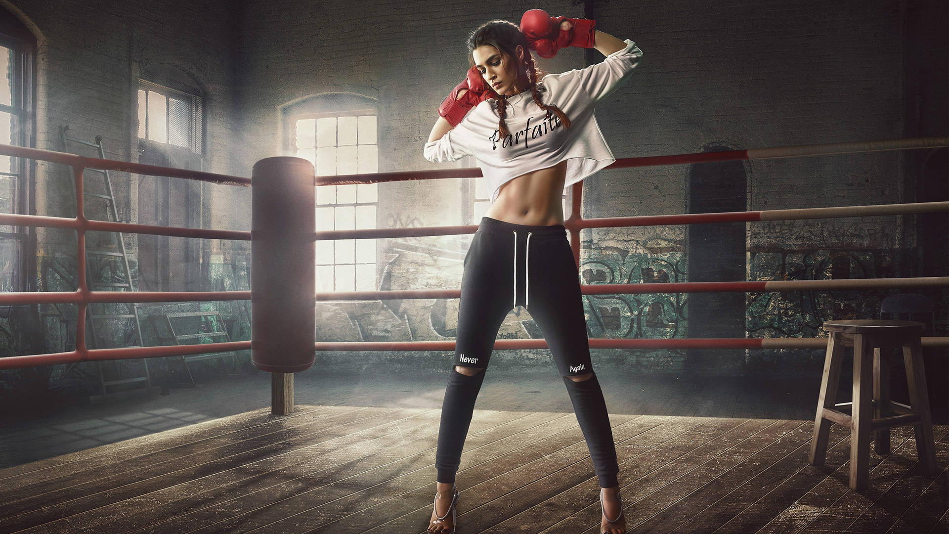 Boxeren Kriti Sanon er ikonet på et lyseblåt tapet. Wallpaper