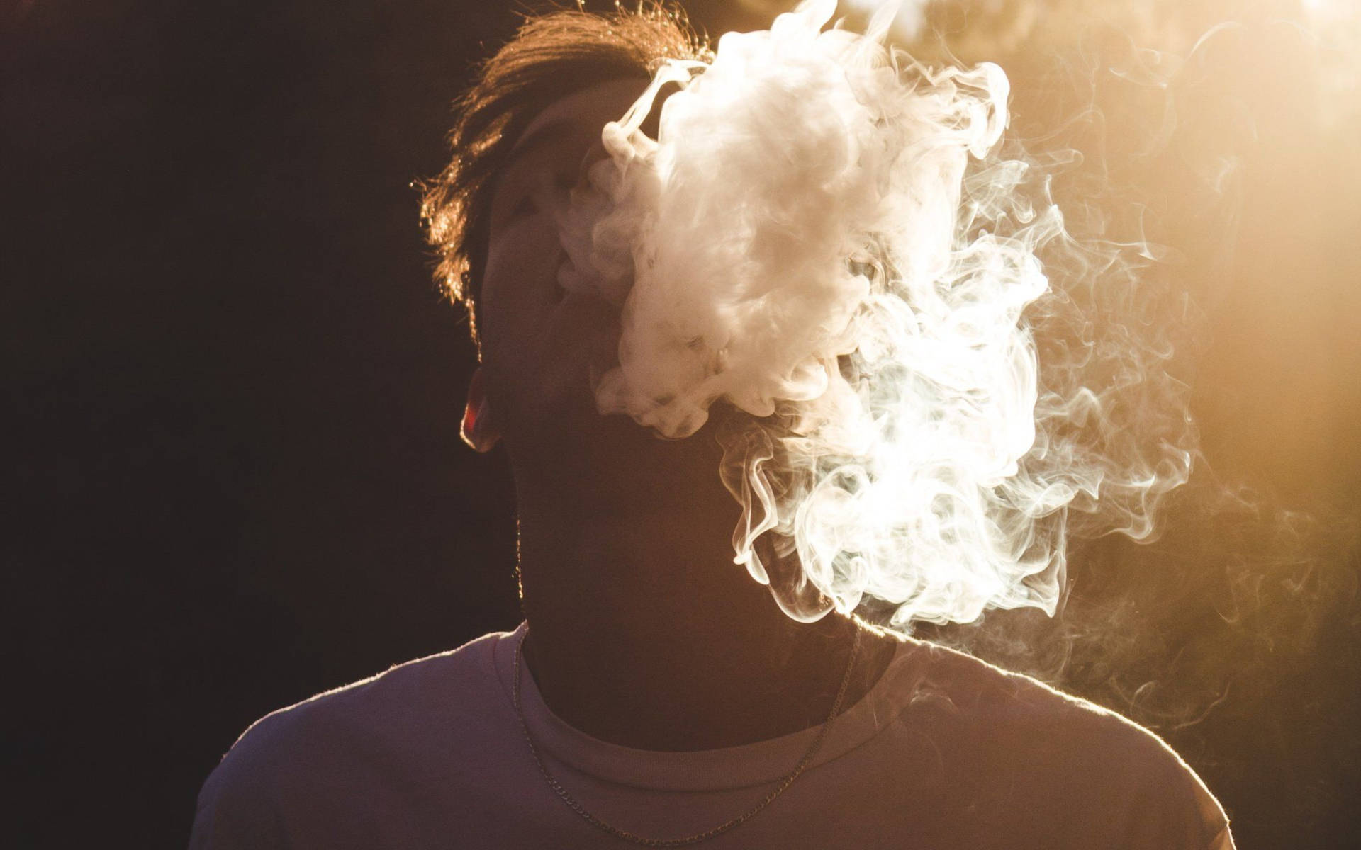 Boy Getting High From Smoking Weed Wallpaper