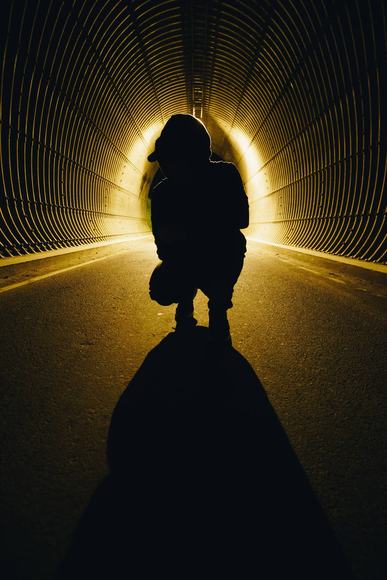 Mysterious Boy Shadow in Dark Tunnel Wallpaper