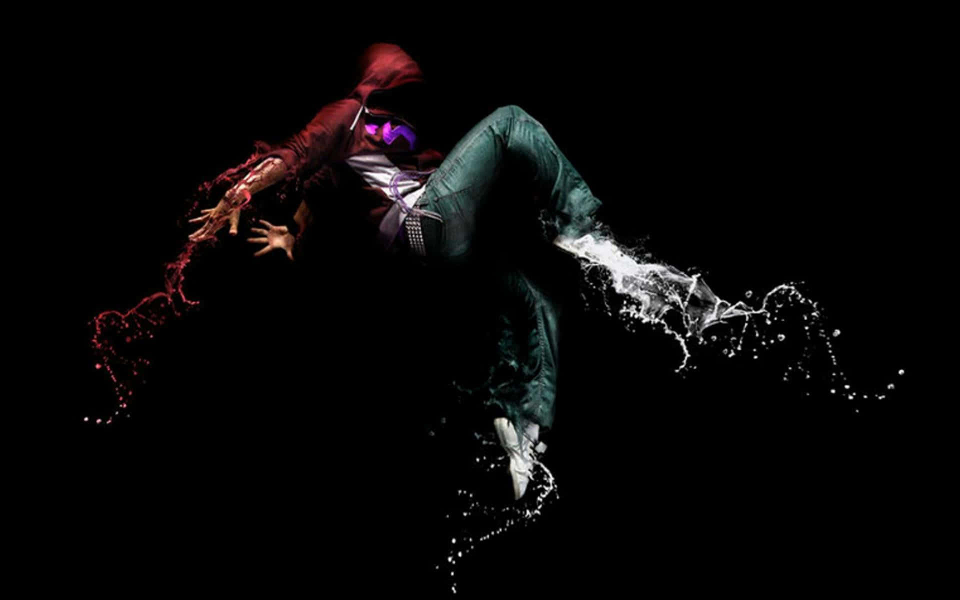 A Person Jumping In The Air With A Black Background Wallpaper