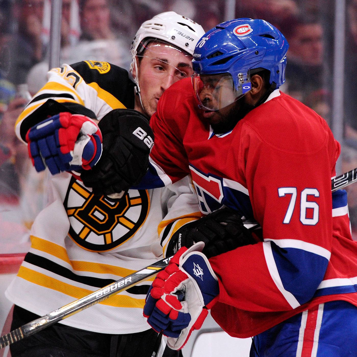 Boston Bruins forward Brad Marchand in a face-off against P.K. Subban. Wallpaper