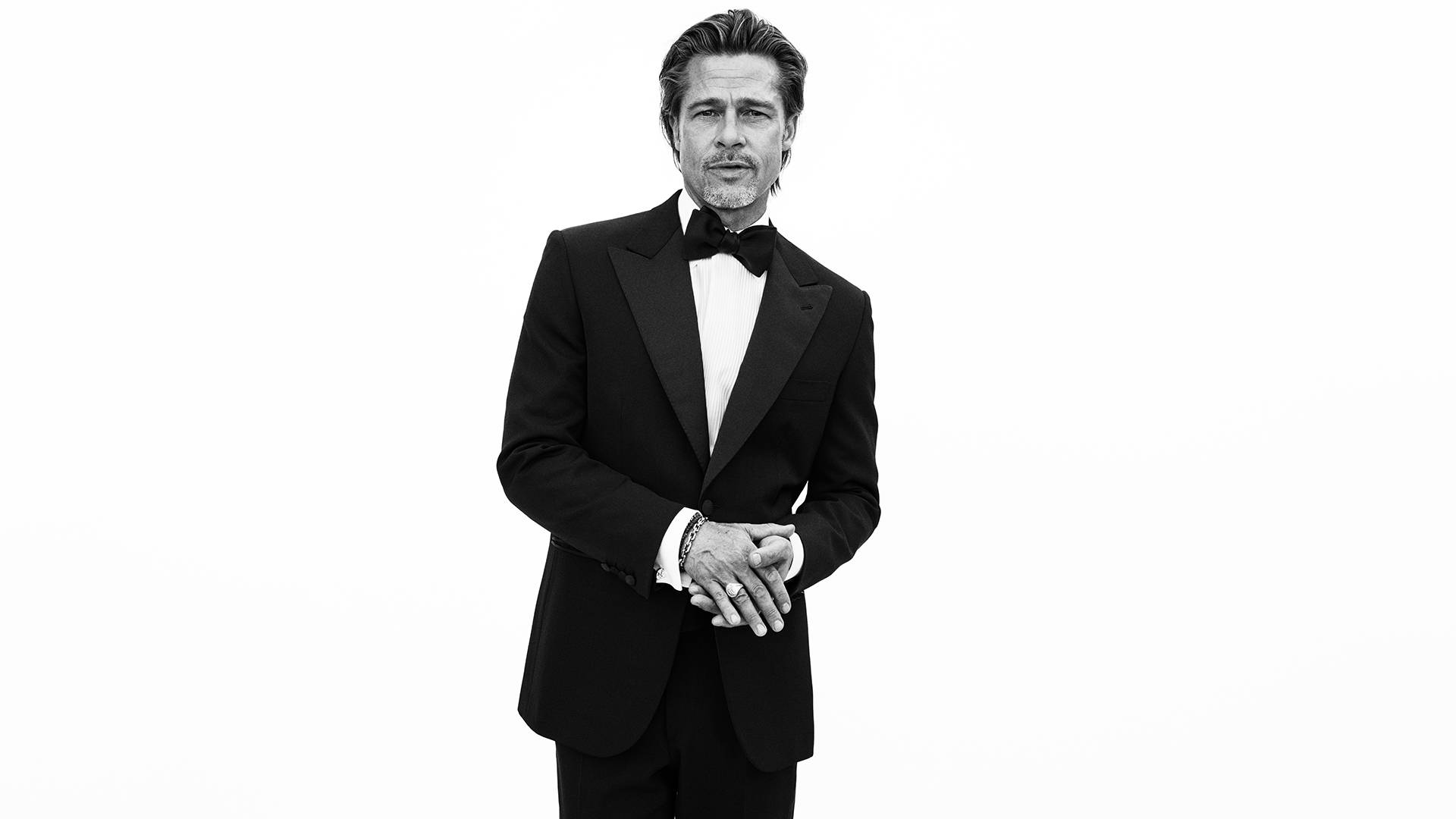Brad Pitt Wearing A Brioni Suit And Tie Wallpaper