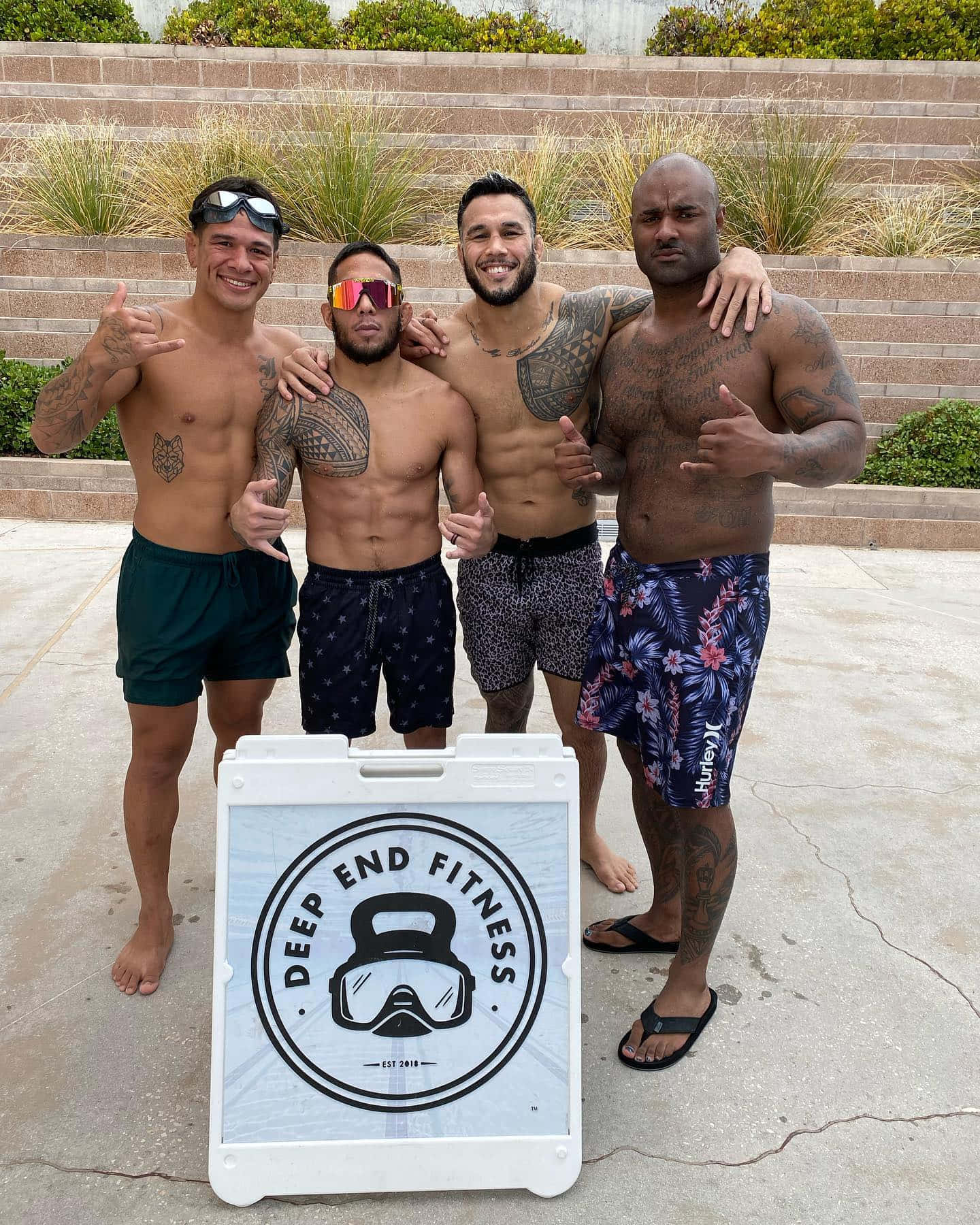 Brad Tavares With His Friends Background