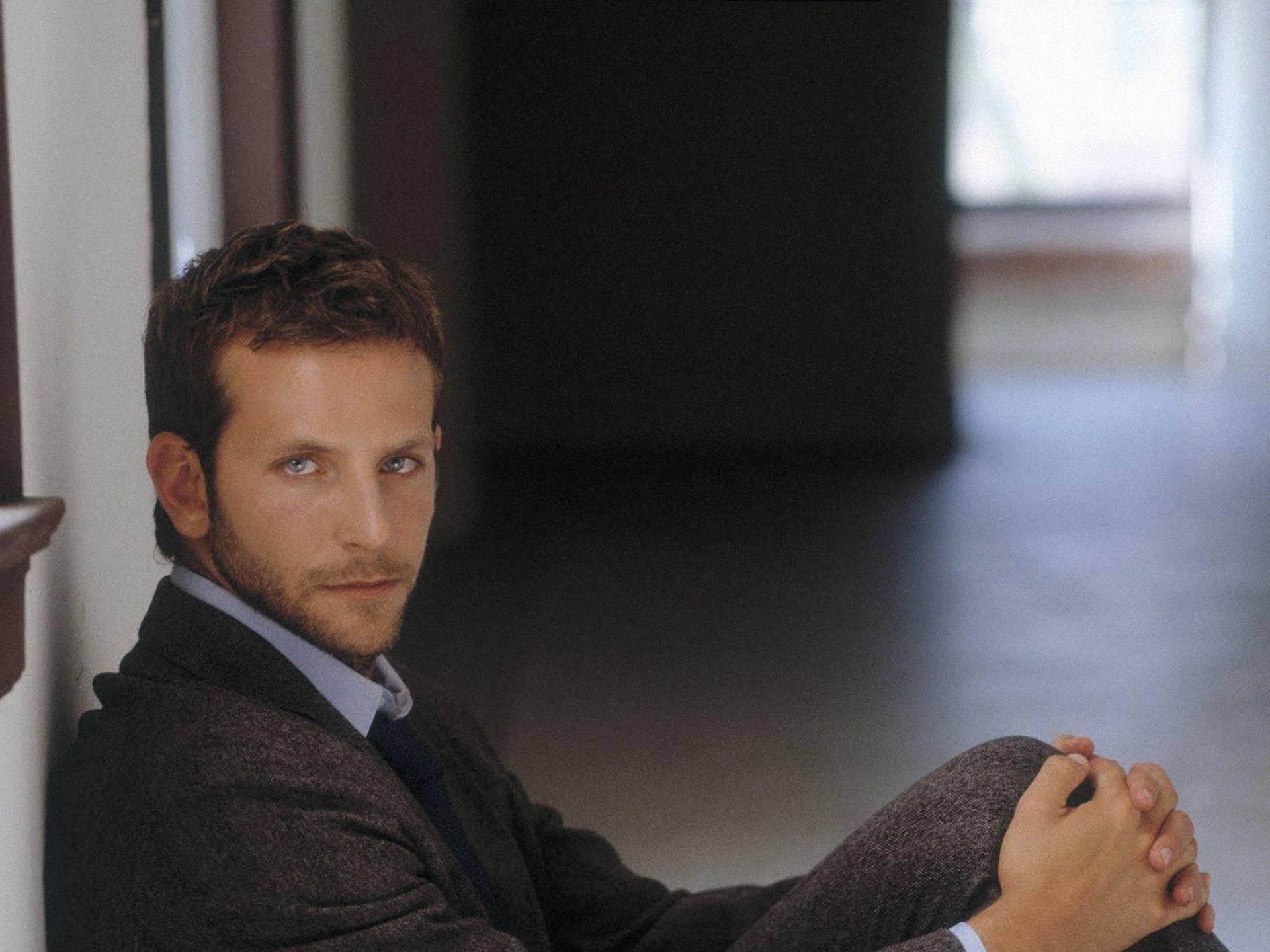Bradley Cooper In Grey Coloured Suit Background