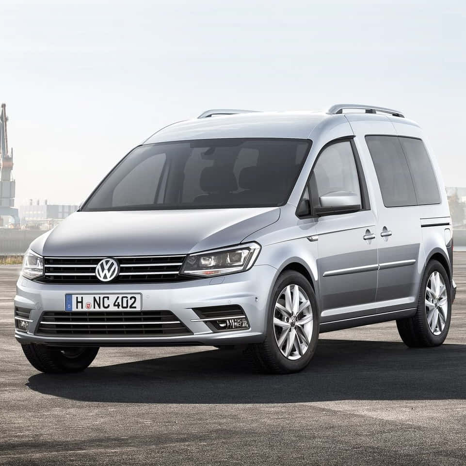 Brand New Volkswagen Caddy On A Smooth Road Trip Wallpaper