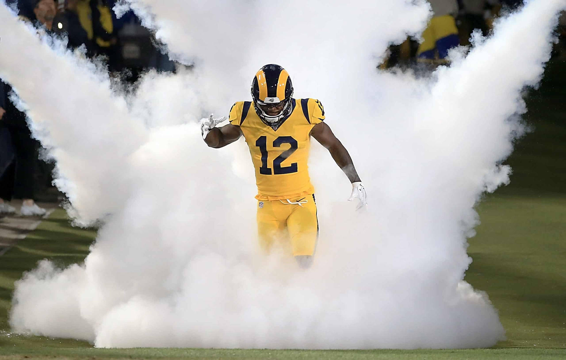 Brandin Cooks Surrounded By Smoke Wallpaper