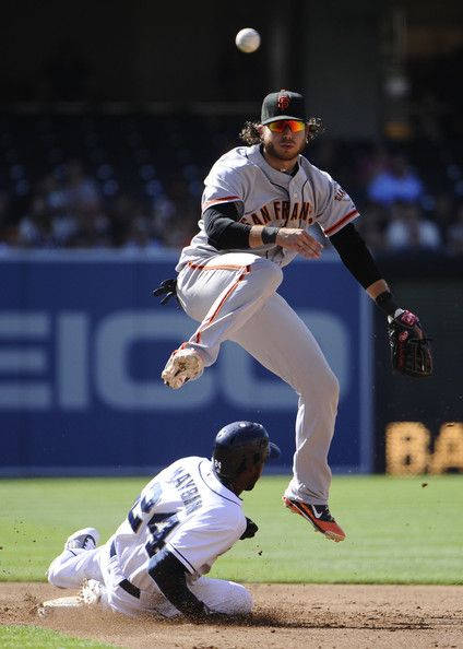 Brandon Crawford In Action On The Baseball Field Wallpaper