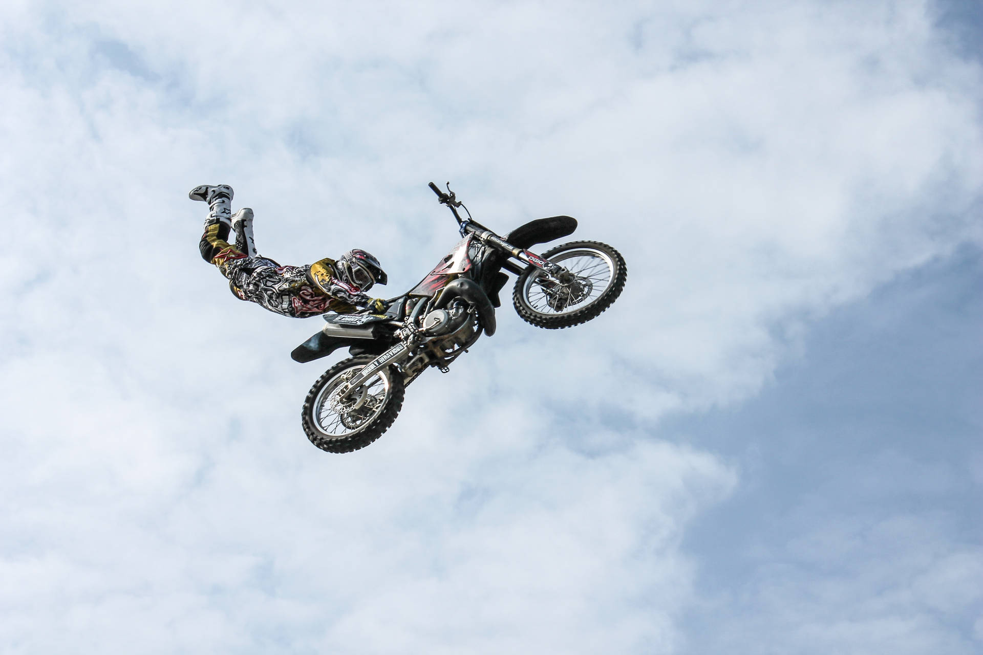 Daring and Brave Motorcycle Stunt Wallpaper