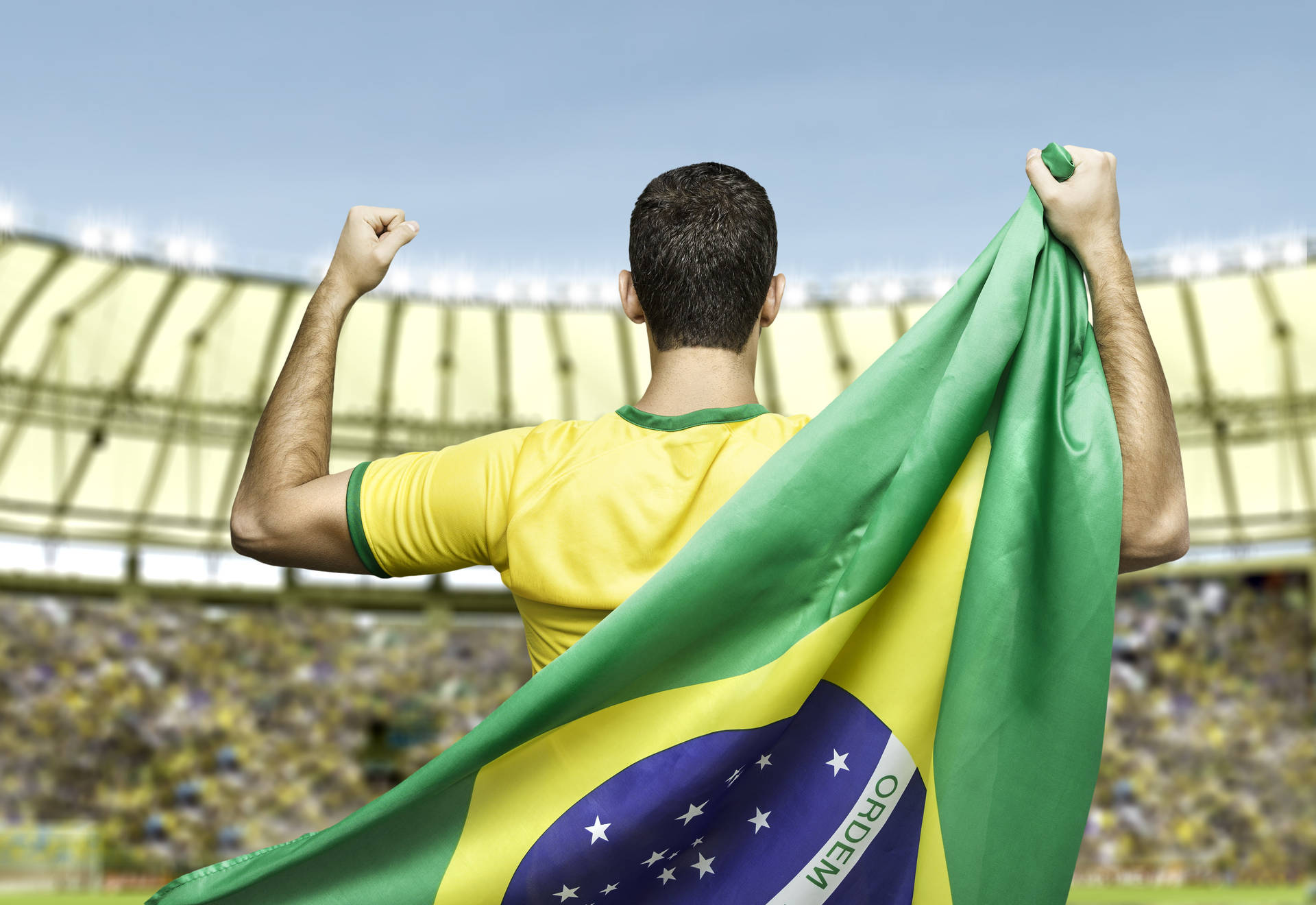 Squadra Nazionale Di Calcio Del Brasile Che Porta Bandiera Brasiliana Sfondo