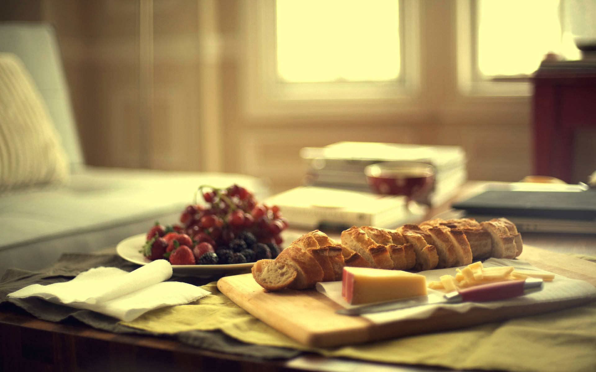 Bread Cheese And Fruits For Lunch Wallpaper