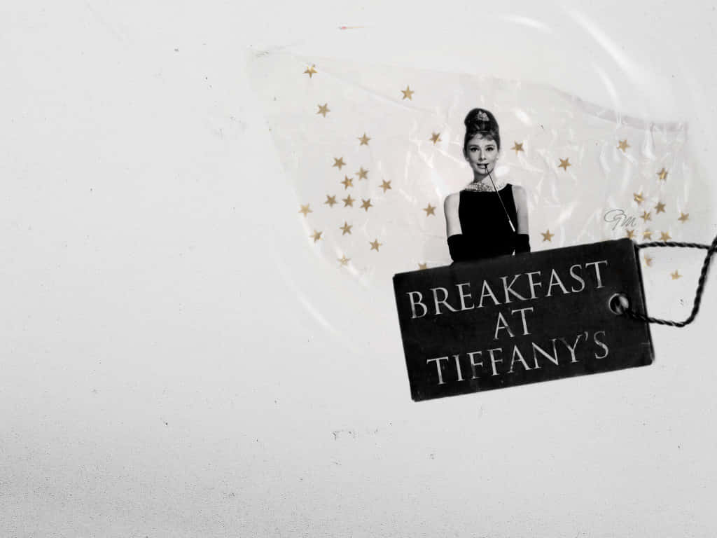 A classic cinematic moment - Audrey Hepburn as Holly Golightly from "Breakfast at Tiffanys" Wallpaper