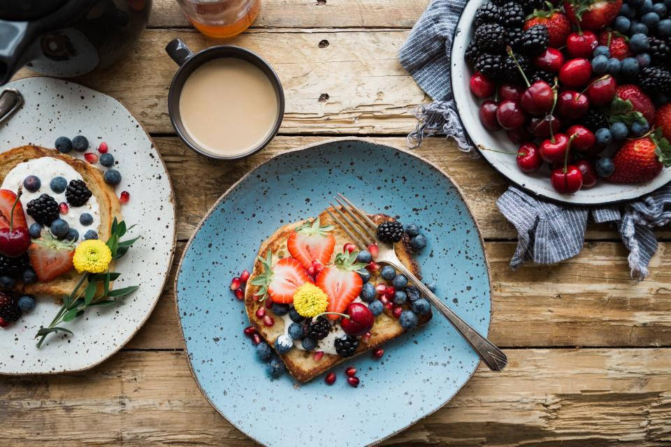 Breakfast Foods Topped With Fruits Wallpaper