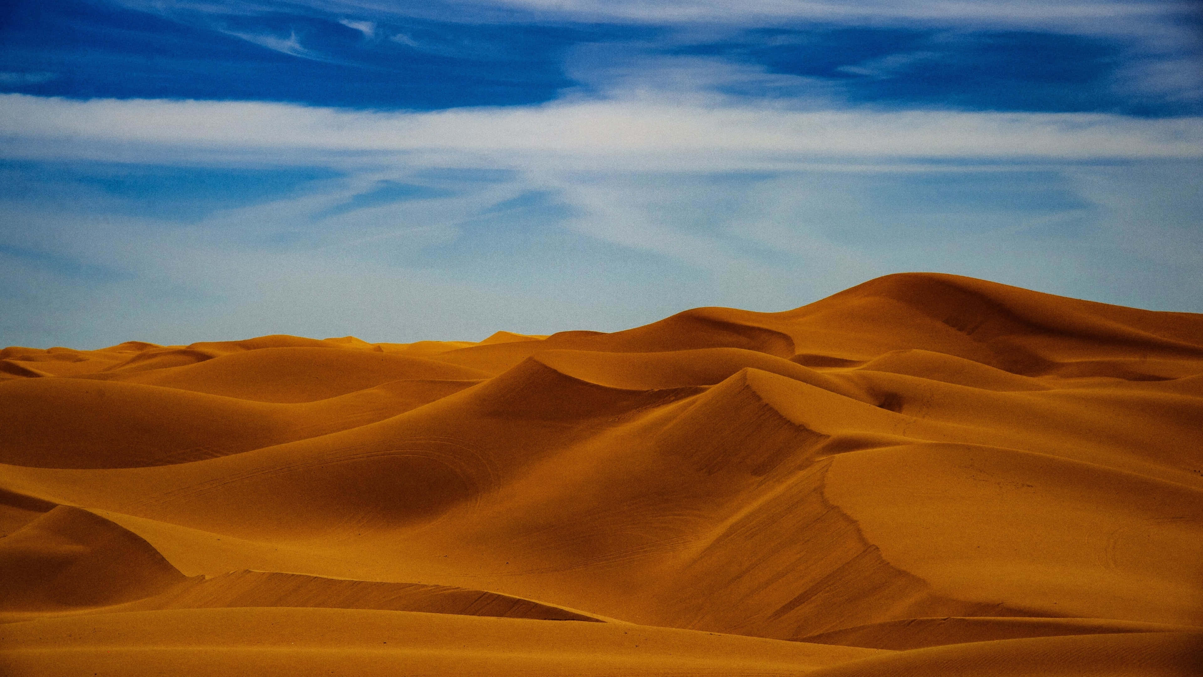 Breathtaking 4k View Of A Desert Landscape Wallpaper