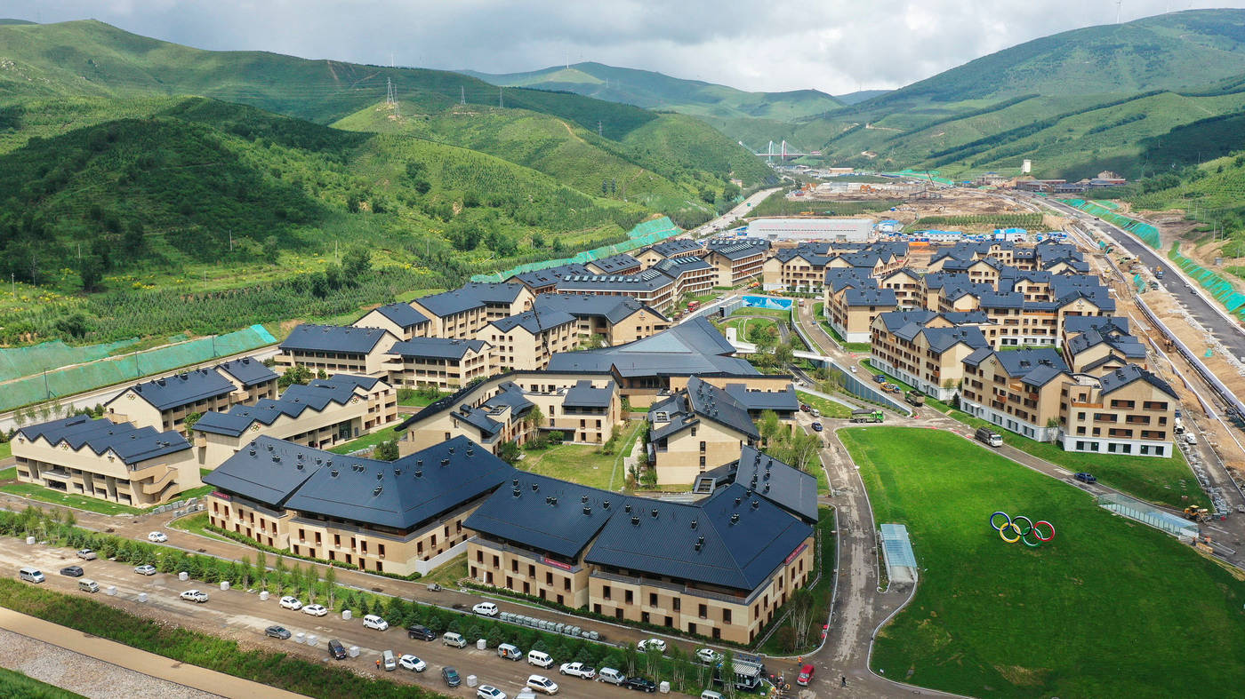 Breathtaking Aerial View Of A Snowy Ski Resort Wallpaper