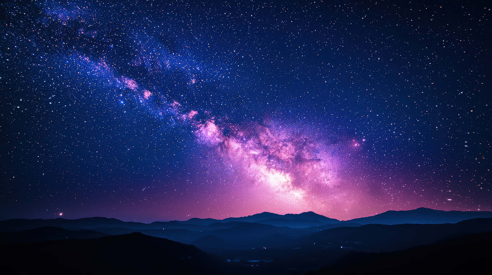 Breathtaking Milky Way Galaxy Over A Serene Mountain Landscape At Night Wallpaper