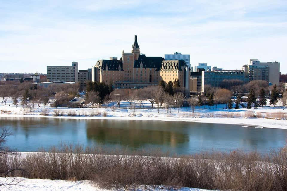 Breathtaking Sunset Over Saskatoon Downtown Skyline Wallpaper