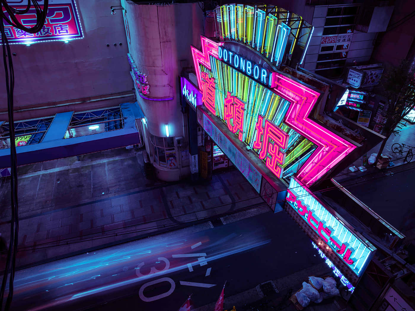 Breathtaking View Of An Urban Nightscape Embracing The Neon Future. Wallpaper