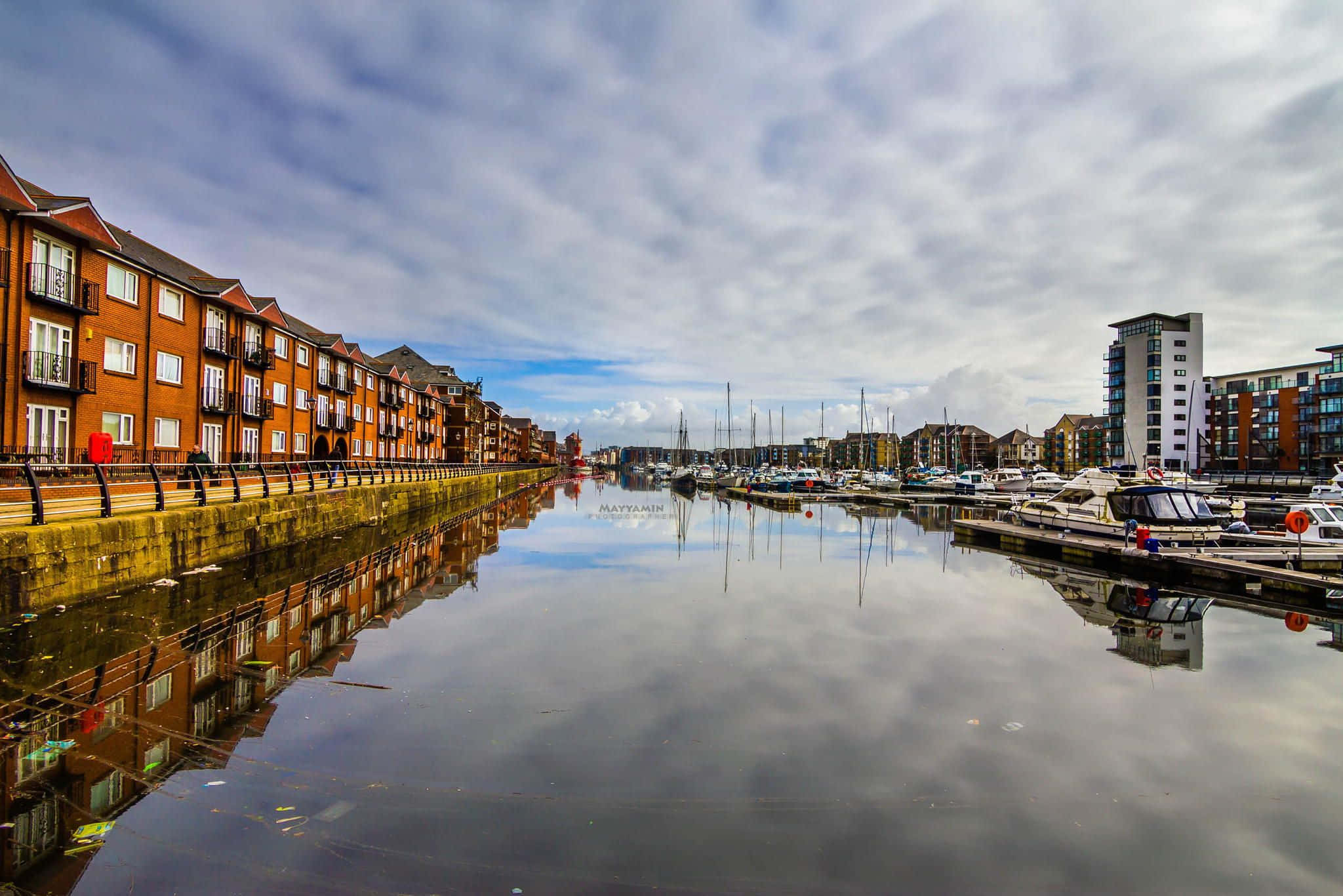 Breathtaking View Of Swansea Cityscape At Dusk Wallpaper