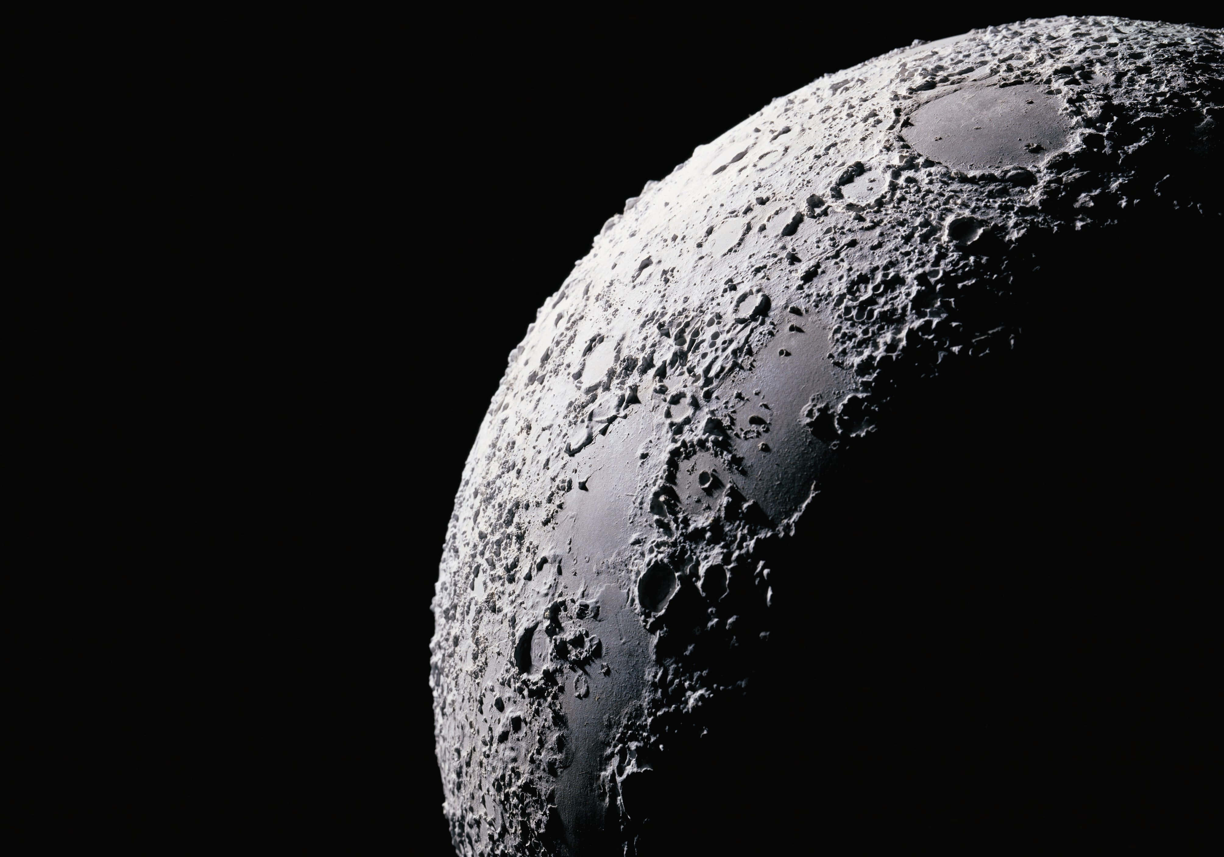 Breathtaking View Of The Moon Surface Wallpaper