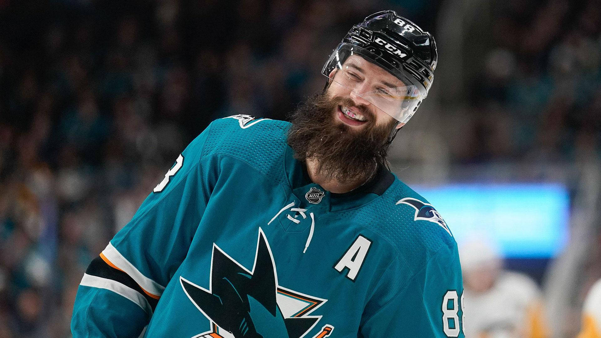 Brent Burns Laughing With Braces Wallpaper