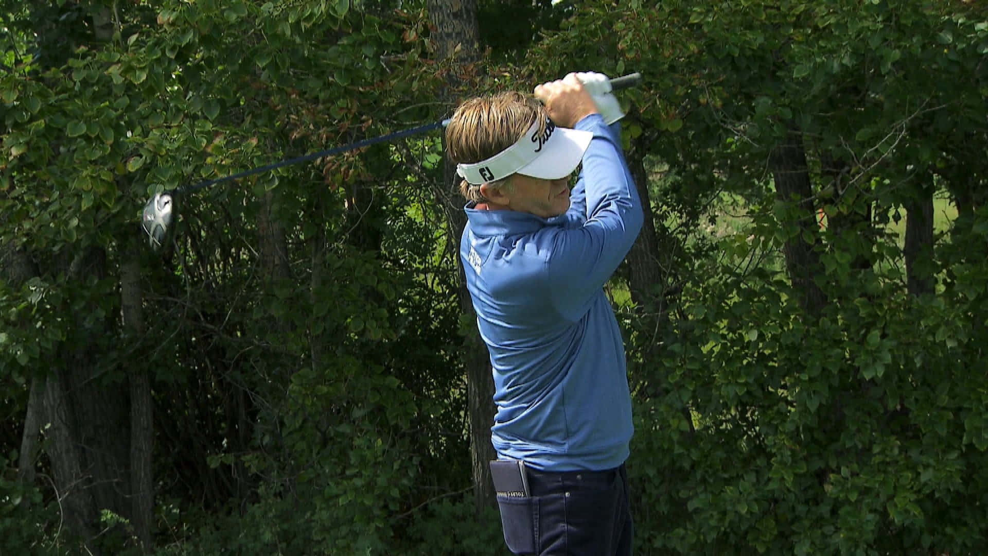 Brett Quigley Golfing By Leafy Tree Wallpaper