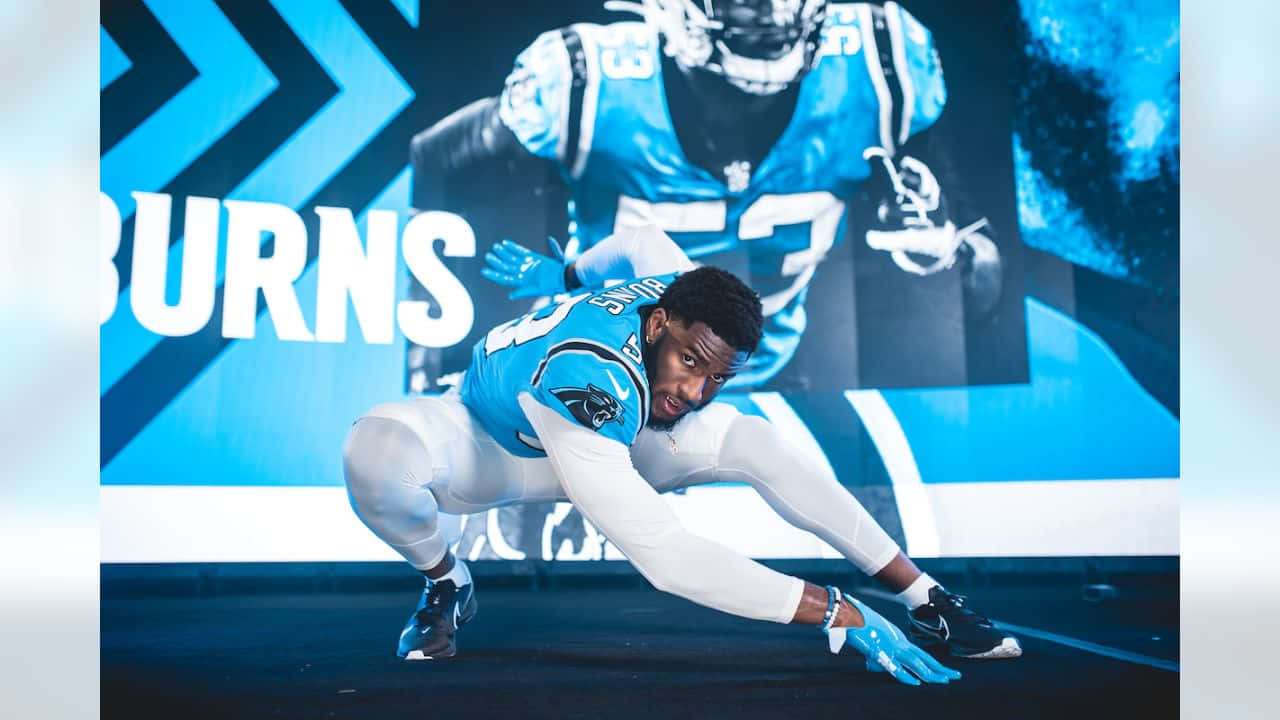 Brian Burns Panthers Defensive Stance Wallpaper