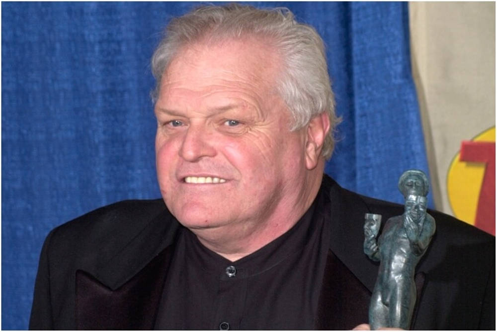 Renowned Actor Brian Dennehy holding a Trophy Wallpaper
