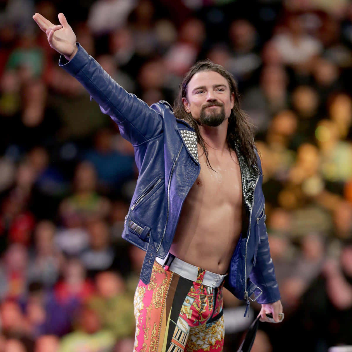 Brian Kendrick Dominating in the Wrestling Ring Wallpaper