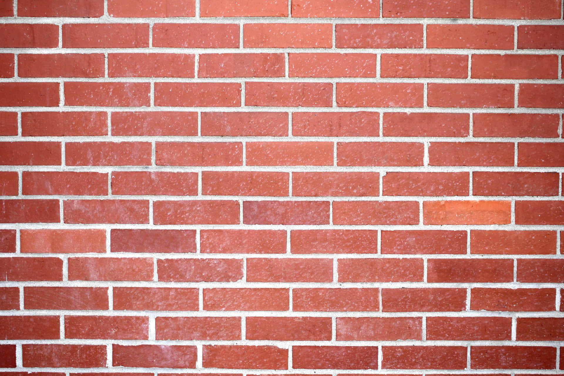 Red brick background with textured surface