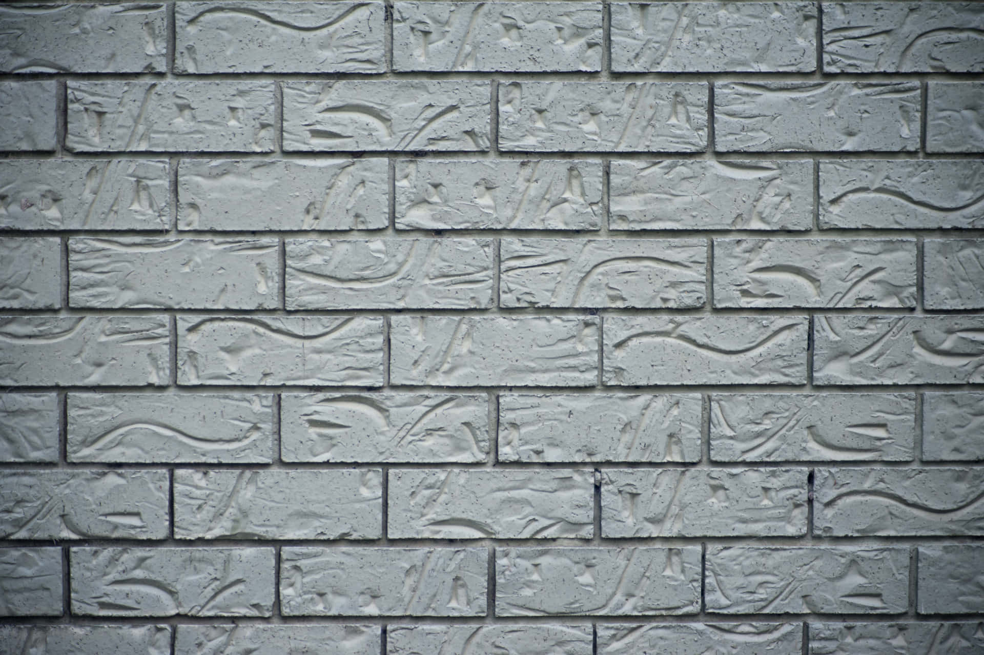 A Brick Wall With A Pattern