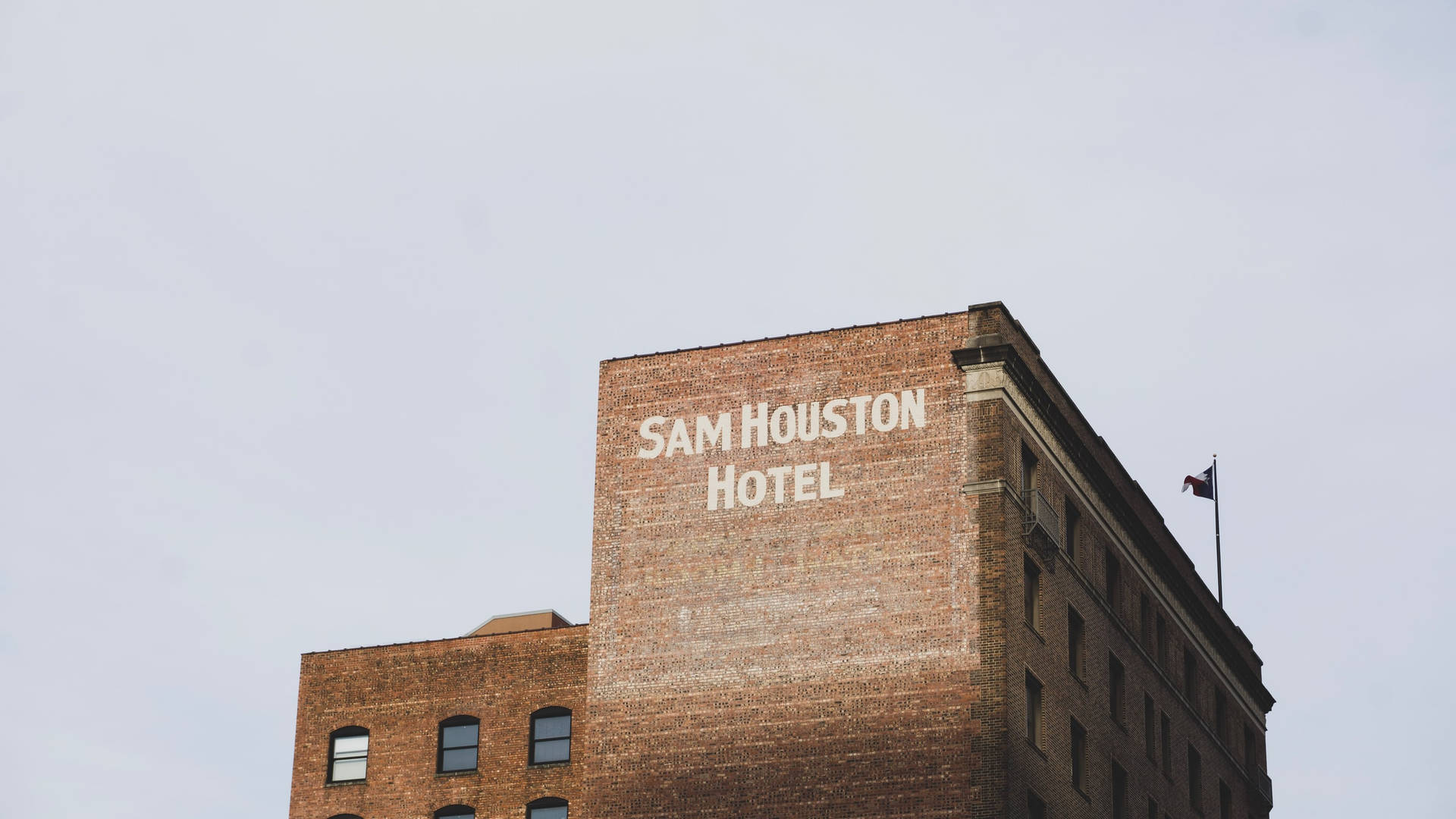 Brick Structure Of Sam Houston Hotel Wallpaper