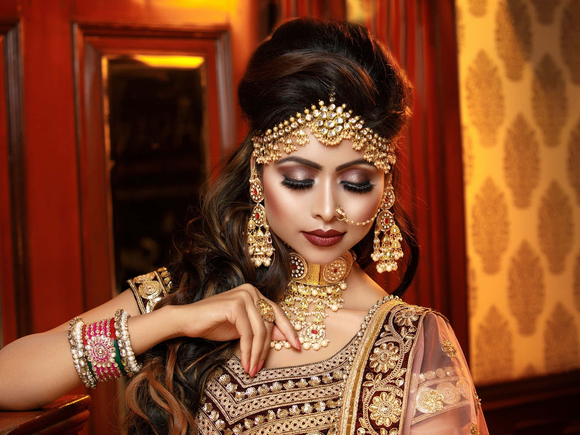 A Beautiful Woman In A Traditional Indian Outfit