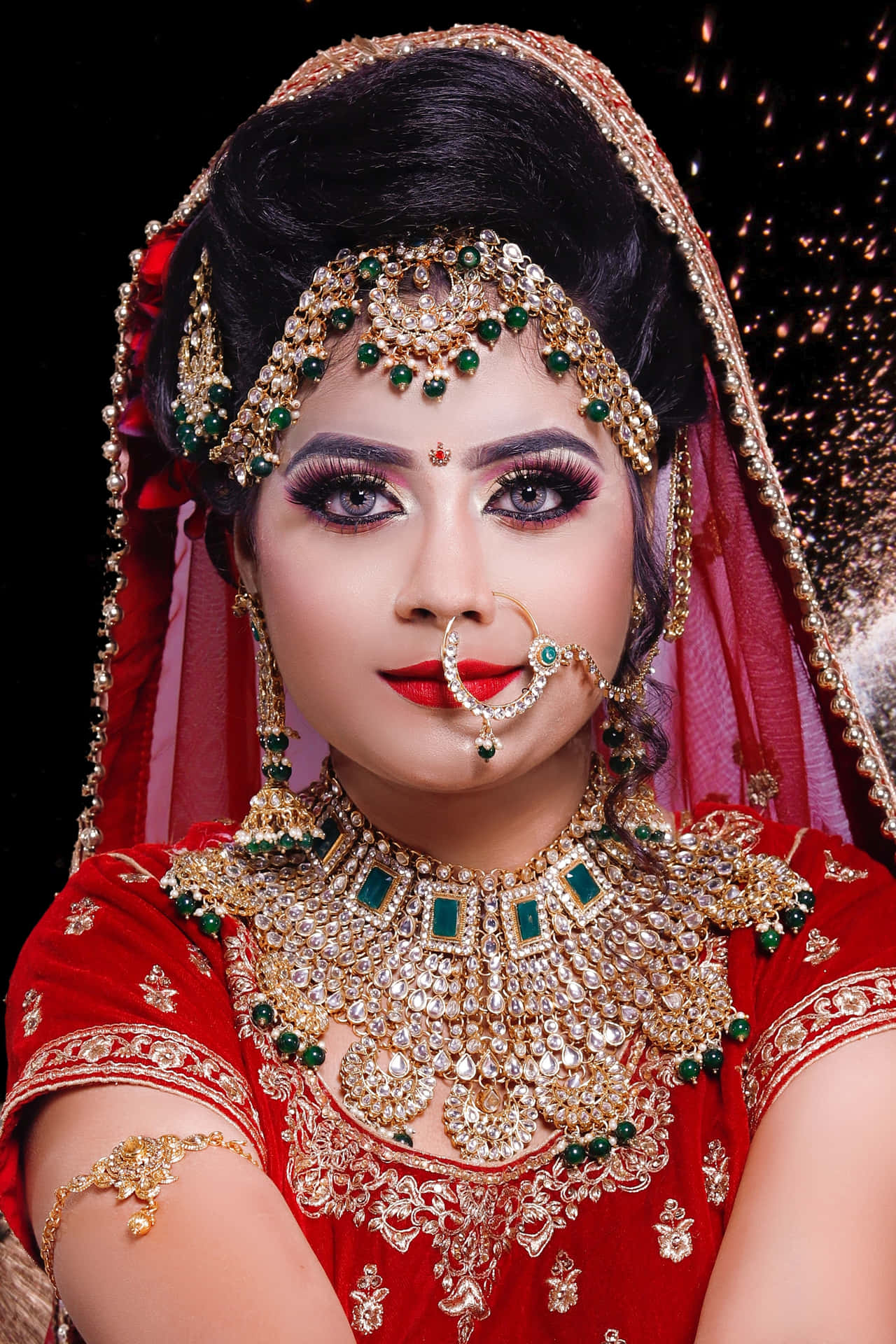 A Beautiful Bride In Red And Gold Makeup