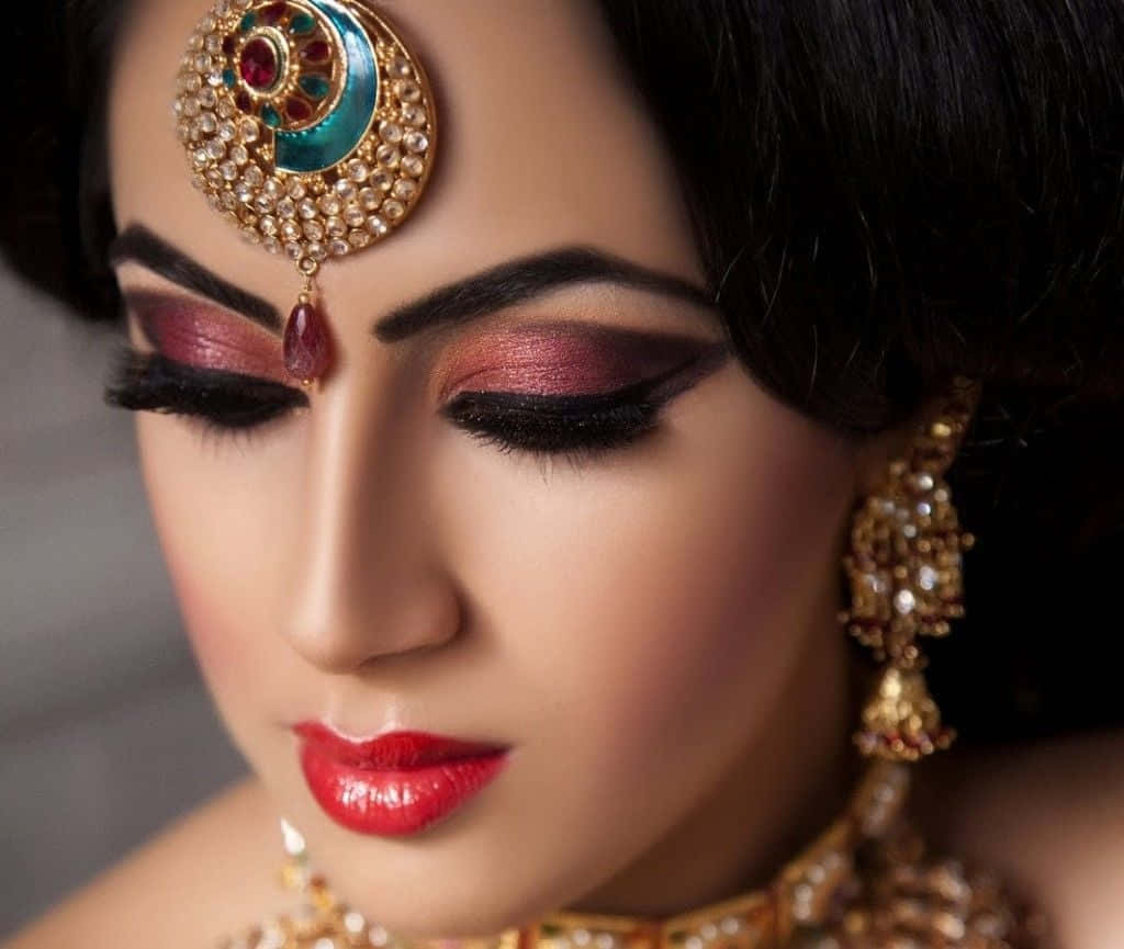 A Woman Wearing Traditional Indian Makeup