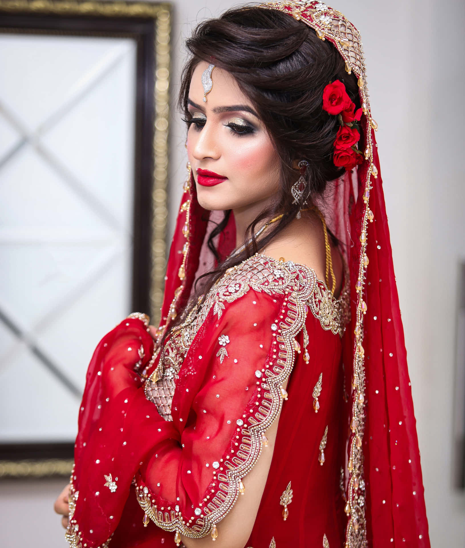 A Beautiful Bride In Red Bridal Wear