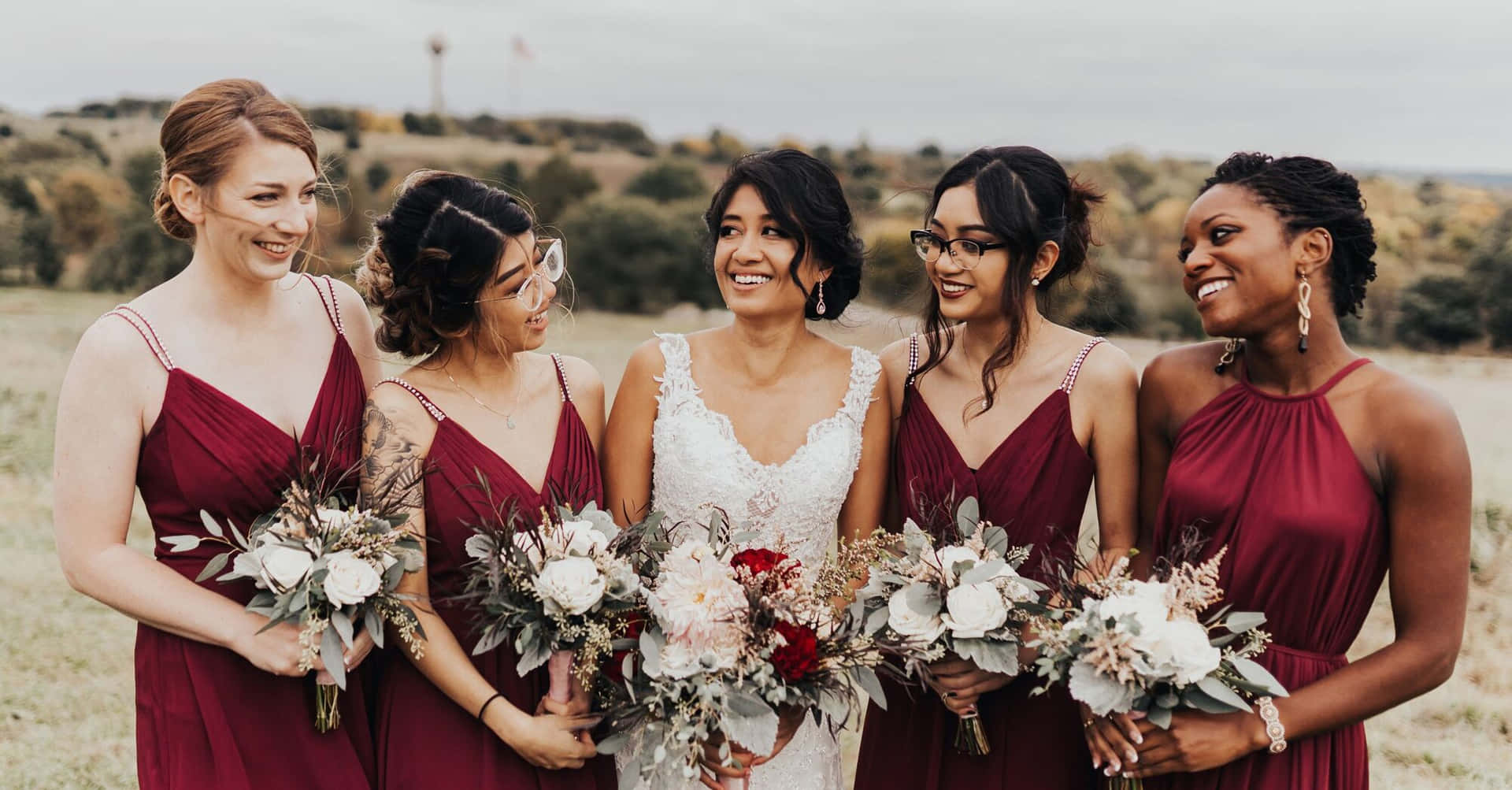 Bride With Bridesmaids Wearing Maroon Dresses Picture