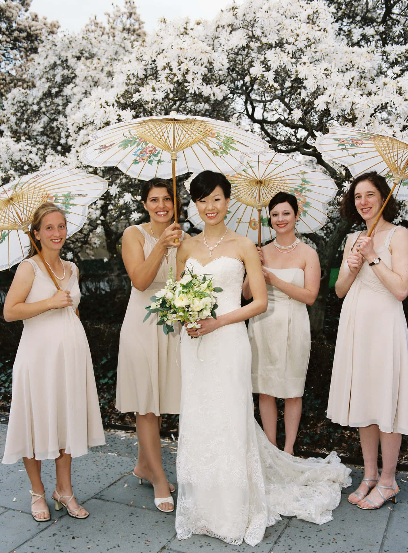 Bride And Bridesmaids With Umbrellas Picture