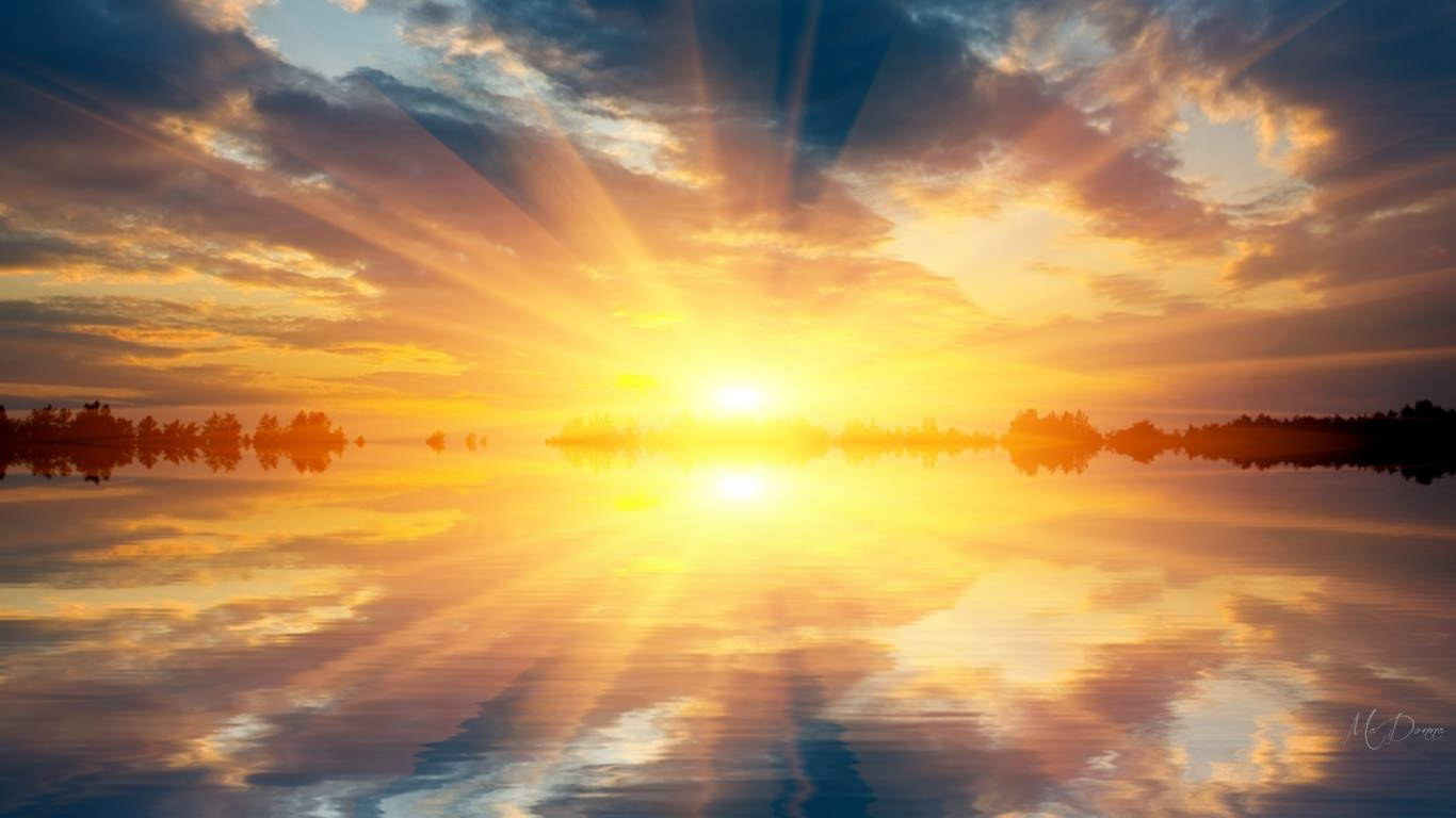 Feel the energy of the bright sunrise on the water. Wallpaper
