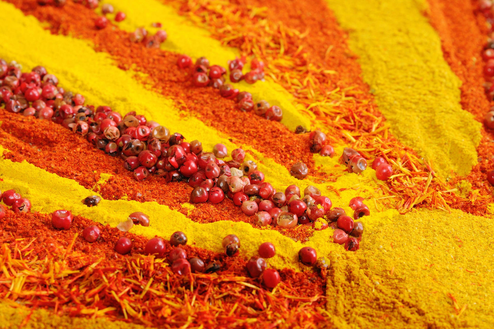 Bright Yellow And Orange Spices Wallpaper