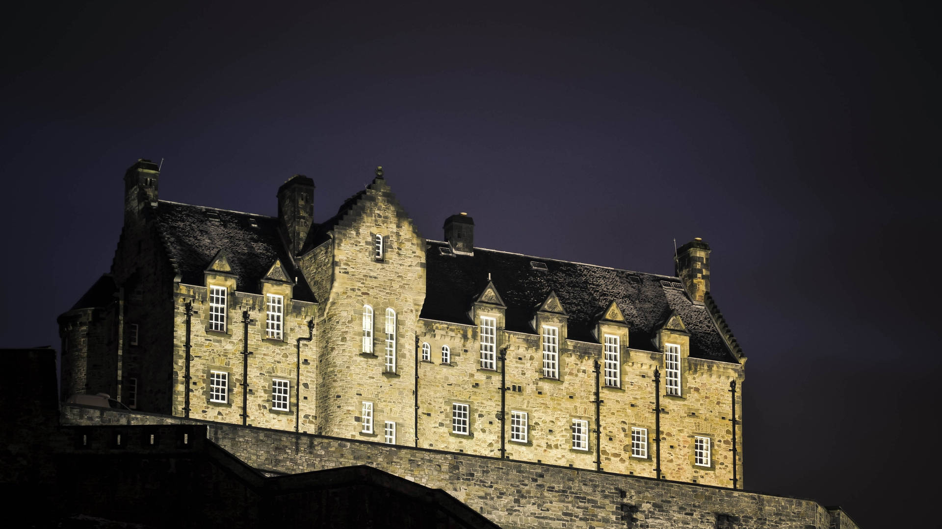 Brightened Edinburgh Castle At Night Wallpaper