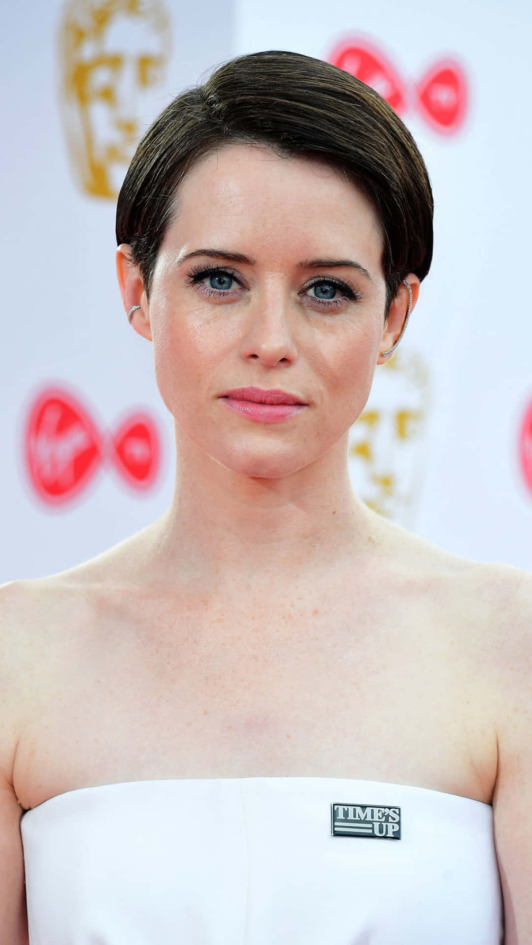 British Actress Claire Foy Posing In An Elegant Dress Wallpaper