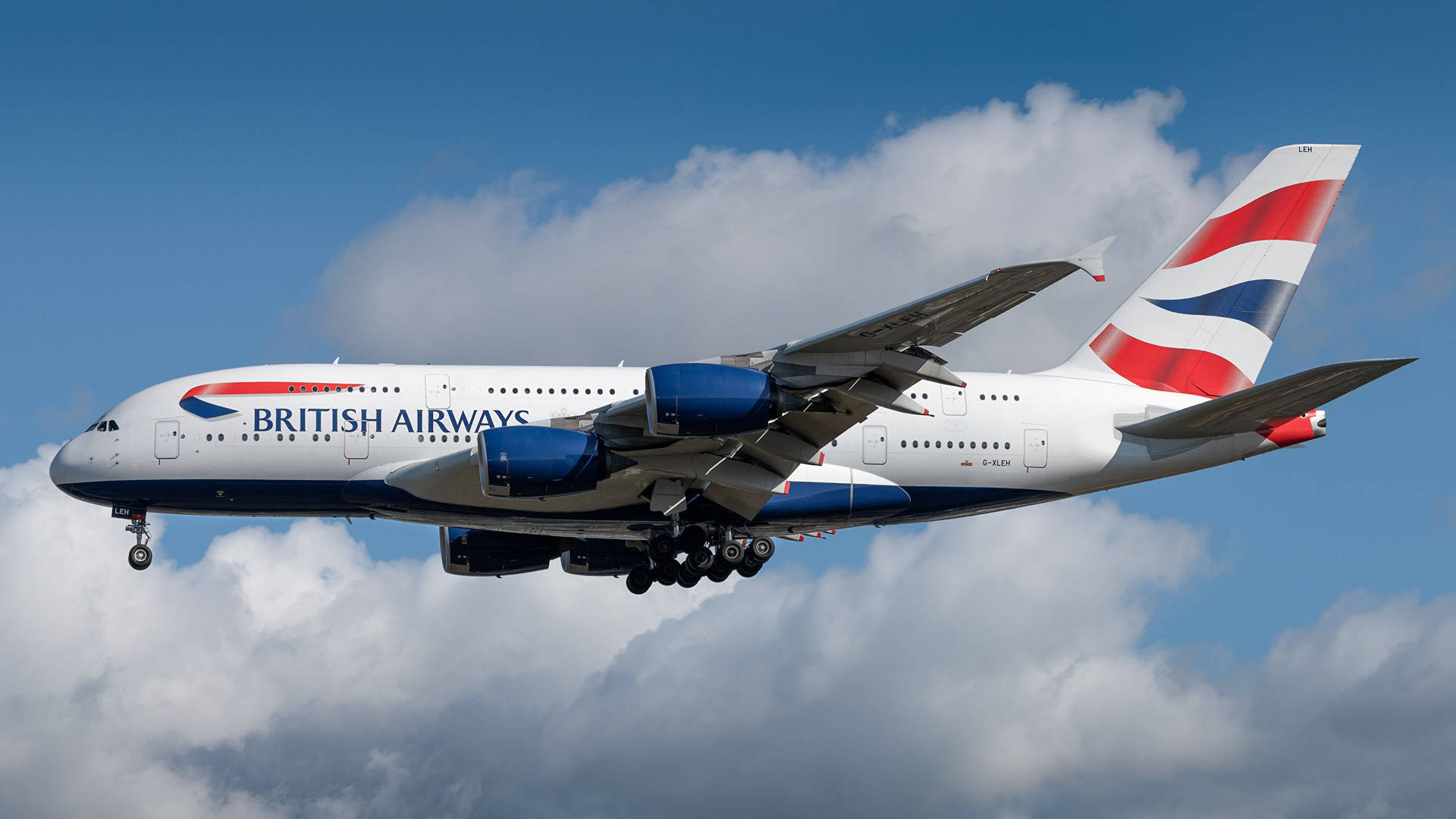 British Airways Airbus på en flyvning over skyerne Wallpaper