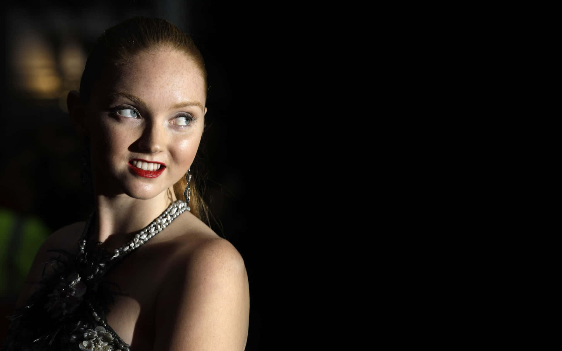 British Model Lily Cole Posing With Stunning Blue Eyes Wallpaper
