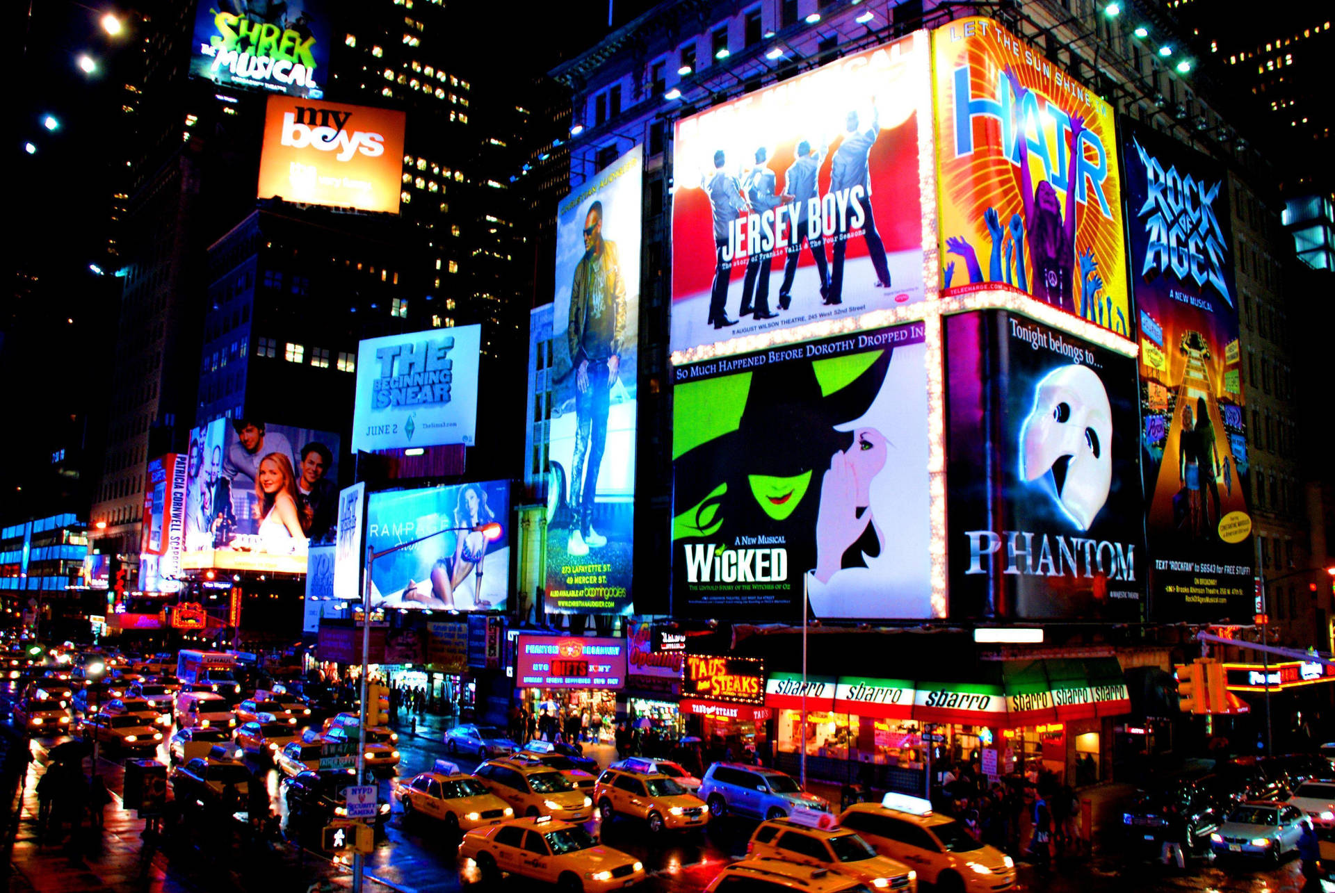 Download Enjoying a night out on Broadway Wallpaper