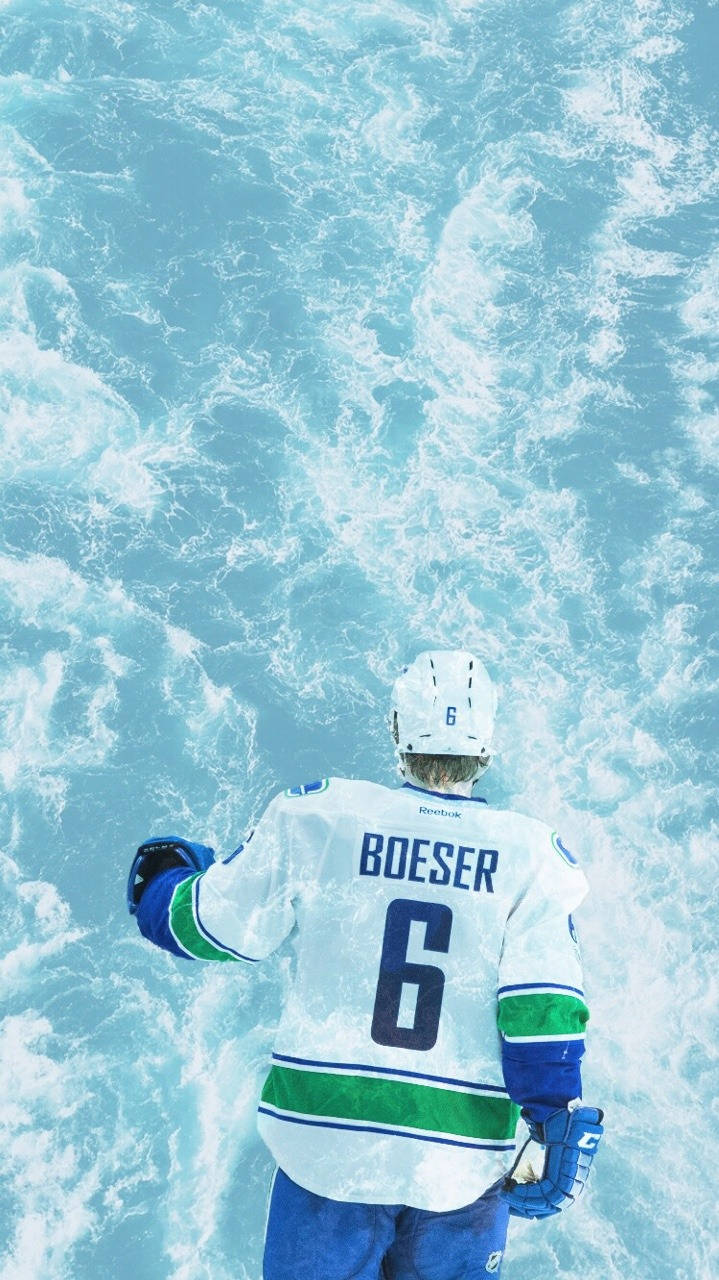 Download Brock Boeser White Jersey Ice Hockey Game Wallpaper