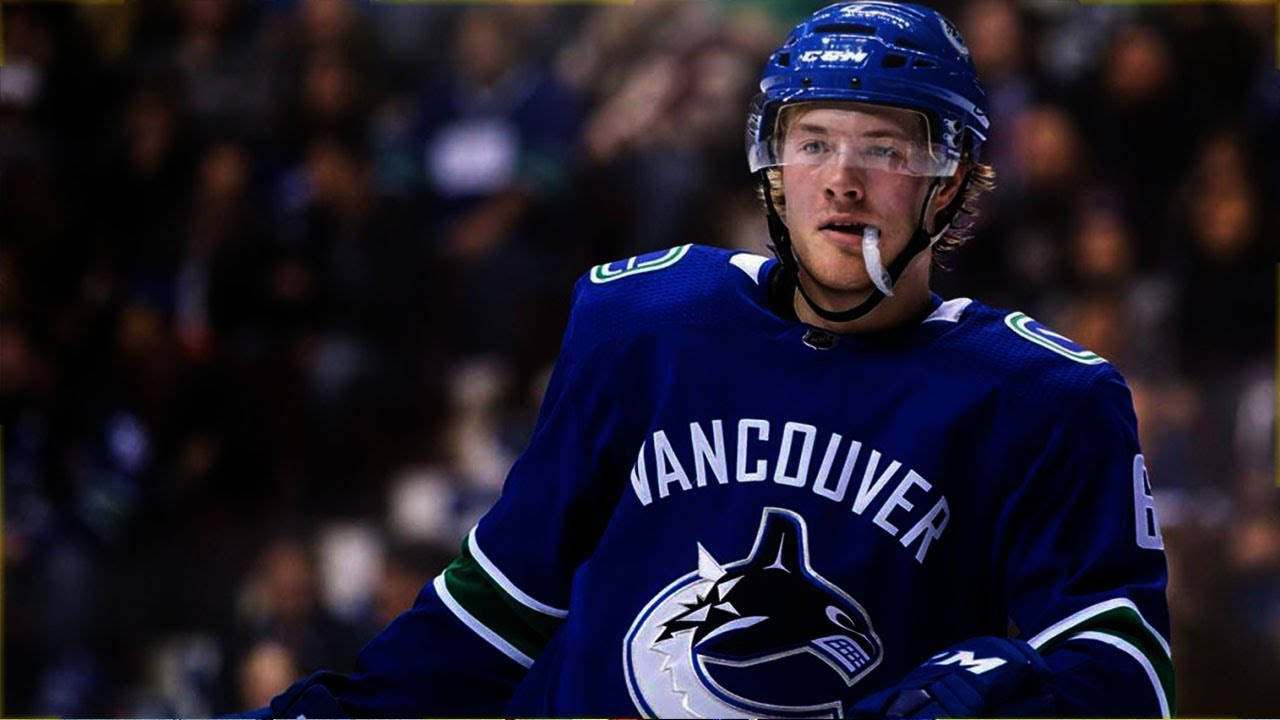 Brockboeser De Los Vancouver Canucks Contra Los San Jose Sharks Fondo de pantalla