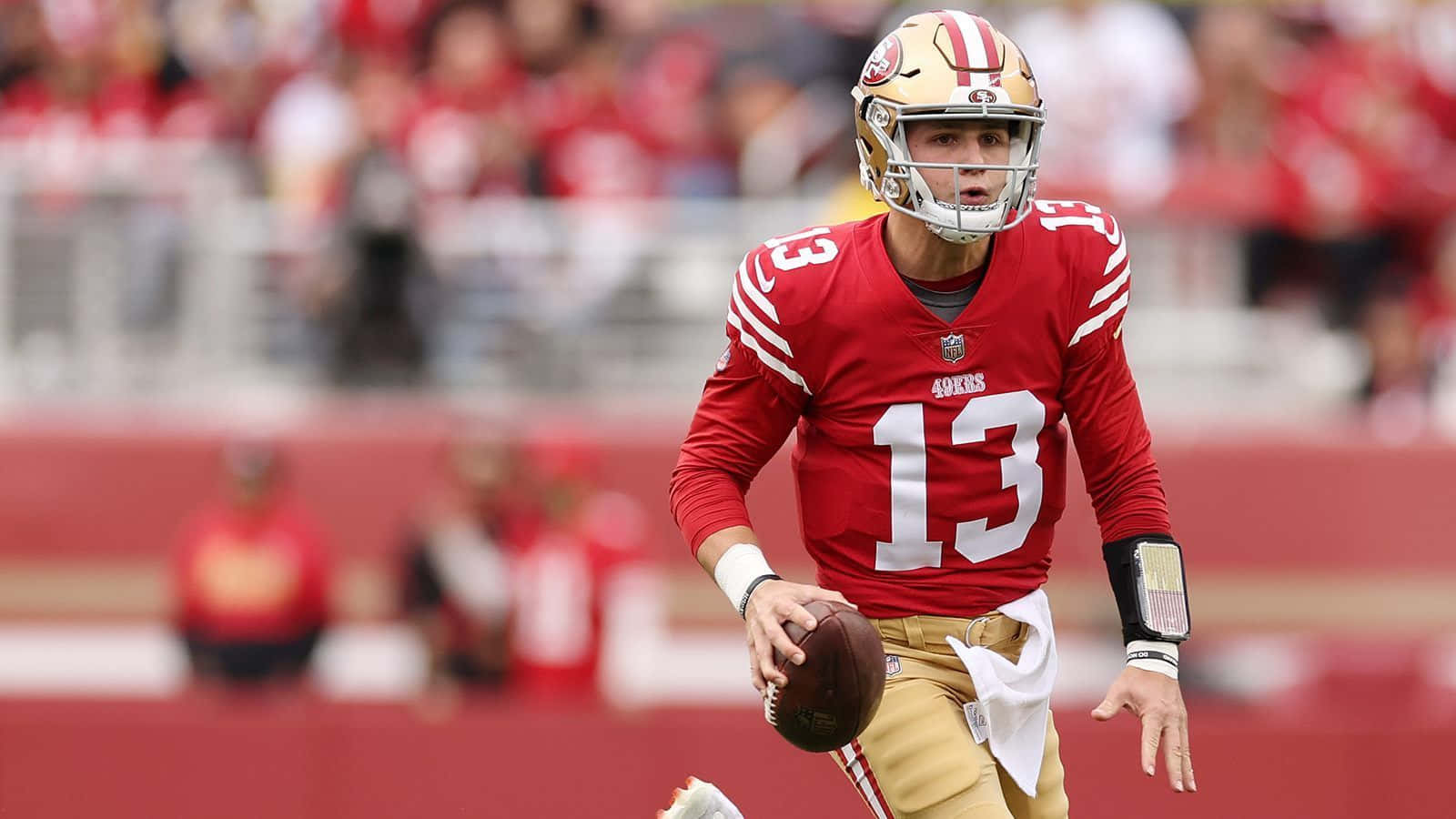 Brock Purdy49ers Quarterback Action Wallpaper